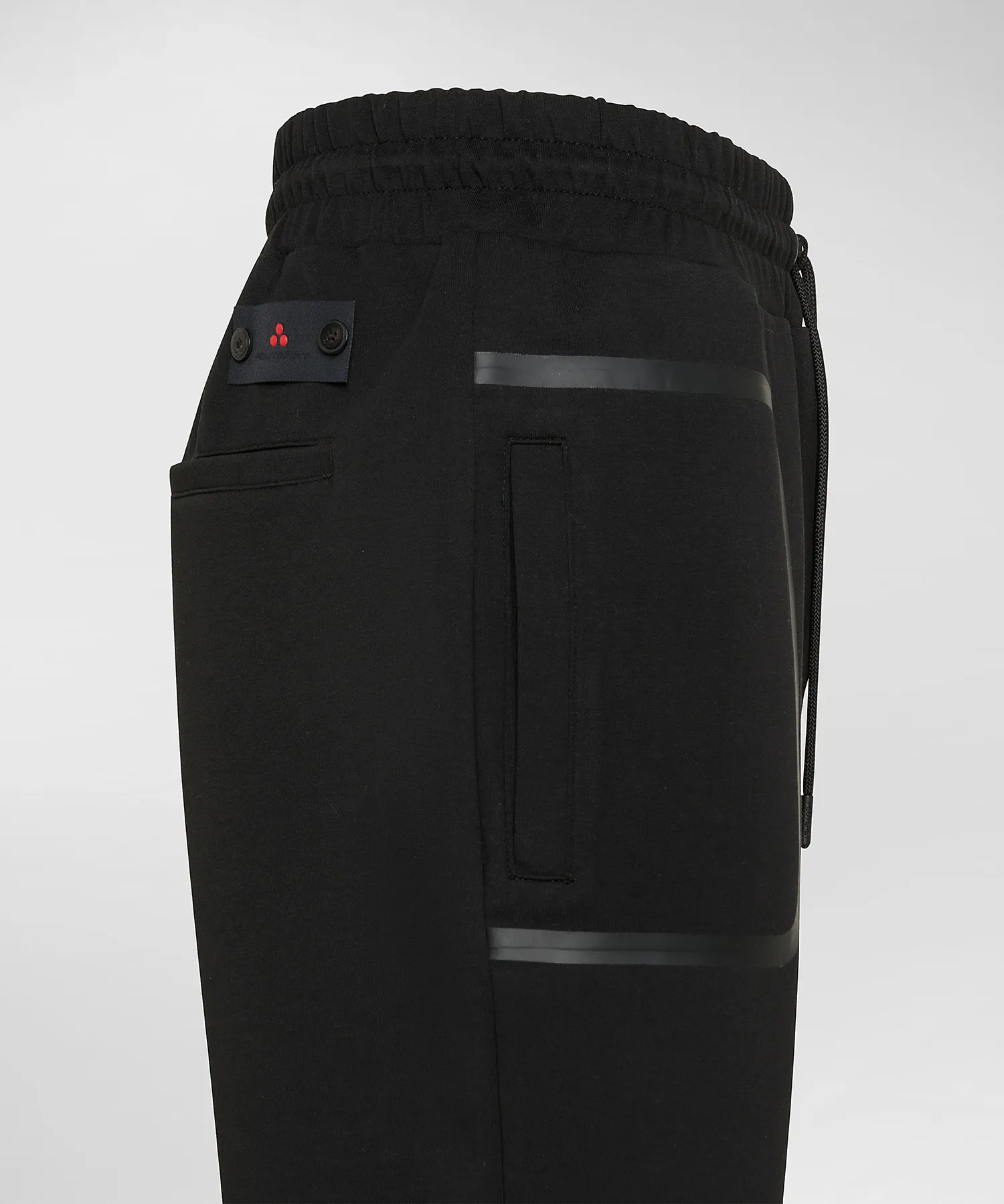 Pantaloni joggers in cotone stretch con nastrature